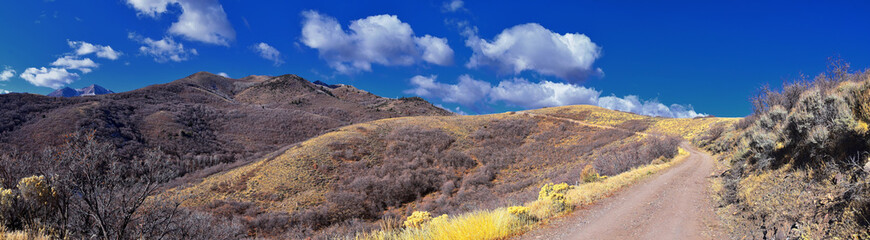 Views of Wasatch Front Rocky Mountains from the Oquirrh Mountains with fall leaves, Hiking in Yellow Fork trail and Rose Canyon in Great Salt Lake Valley. Utah, United States. USA.