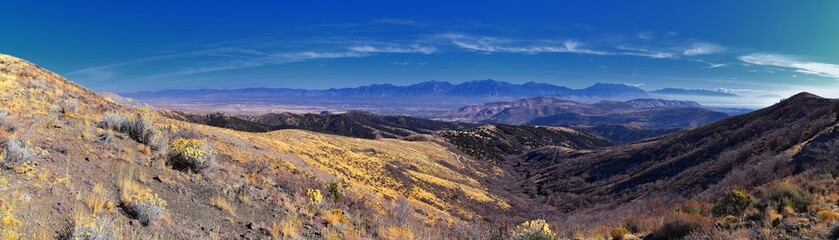 Views of Wasatch Front Rocky Mountains from the Oquirrh Mountains with fall leaves, Hiking in Yellow Fork trail and Rose Canyon in Great Salt Lake Valley. Utah, United States. USA.
