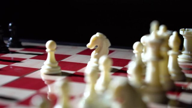 Close up of chessboard with rotation with white moving knight to f3 - 4K