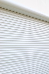 white roller shutter door closed security in modern house