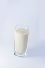 A glass of milk or a glass of soy milk isolated on a white background