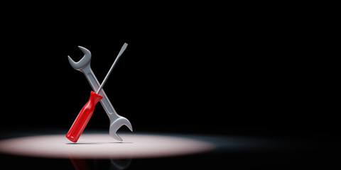 Work Tools Spotlighted on Black Background