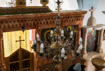 Large decorative lamp hanging in the St. Nicholas church dungeon in Bayt Jala - a suburb of Bethlehem in Palestine