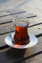cup of Turkish tea on wooden table