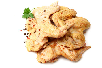 Raw chicken wings isolated on white background