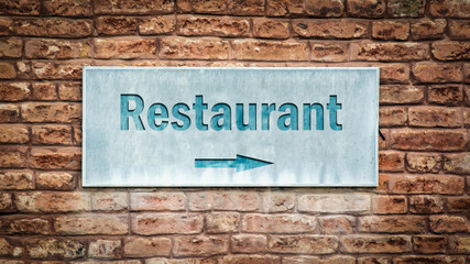 Street Sign to Restaurant