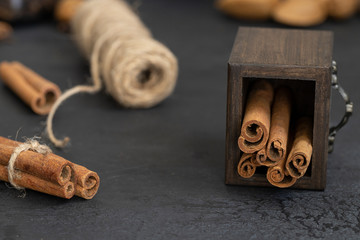 Natural Cinnamon stick on dark concrete background