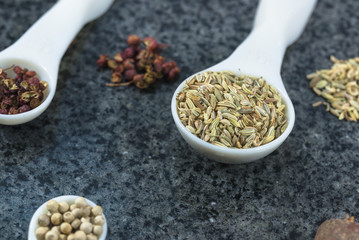 Various edible spices and condiments are placed together.