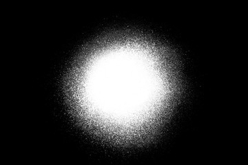 Close-up of a white spray paint spot, isolated on black background. - obrazy, fototapety, plakaty