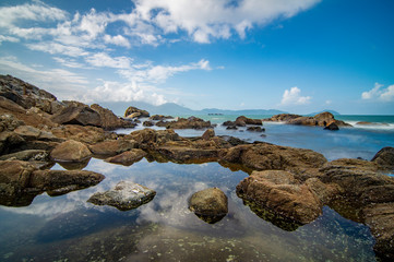 Da Nang, Vietnam: View of Da Nang beach with rocks and waves.