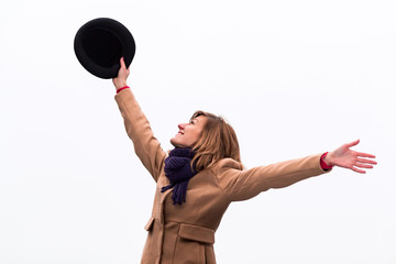Woman smiling and enjoying winter time.
