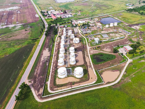 Aerial view of oil storage tanks. Industrial facility for the st
