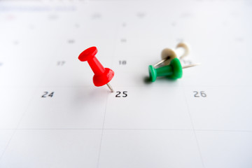 Thumbtack a date on calendar concept for important date, meeting reminder, planning for business,...