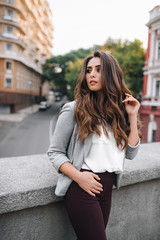 Young girl with professional makeup and hairstyle