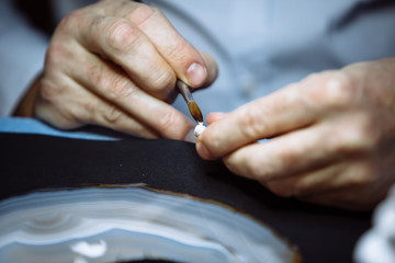 Dental technician makes dentures.