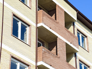 Balconies and windows of a multi-storey new house