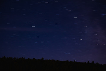 Milky way stars on a dark night sky.