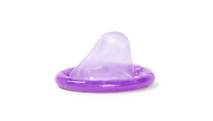 Purple condom, isolated