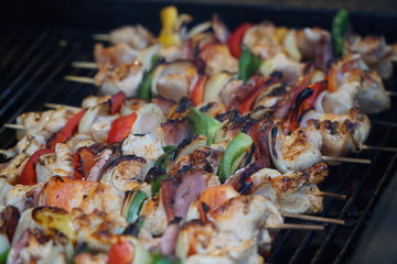 Barbecue with delicious grilled meat on grill on christmas market
