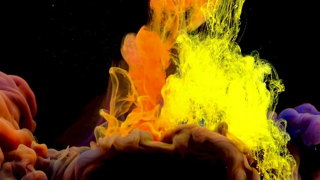 Stock video  Color paint drops in water , abstract color mix , drop of Ink color mix paint falling on water Colorful ink in water, 4K footage,