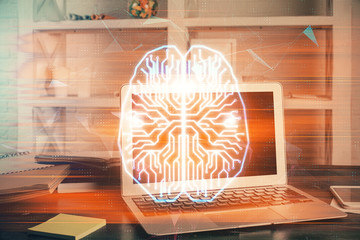 Double exposure of work table with computer and brain sketch hologram. Brainstorming concept.