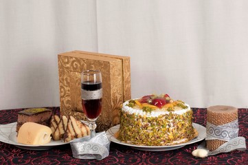 Wet cake plate and a glass of juice