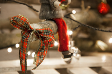 little bow on a christmas tree. Garlands decorations and toys. Christmas