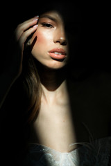 Gorgeous beauty young bride portrait. Beautiful bride with wedding makeup