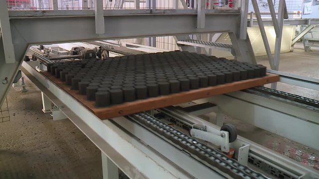 Production of cinder block briquettes