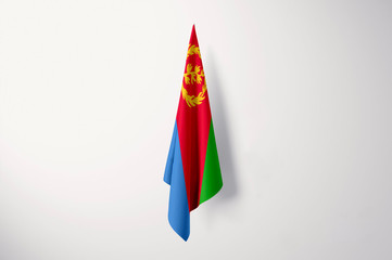 Obraz premium Eritrea Flag Hanging Isolated with Copy Space - 3D Illustration