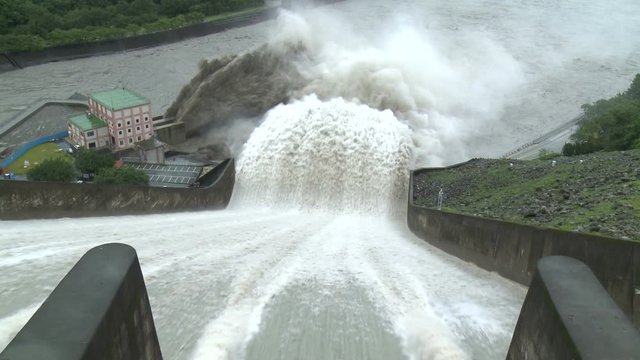Water Overflows Dam Spillway After Tropical Storm Drop Heavy Rain - Trami