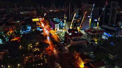 Aerial view on Tel-Aviv. Urban night city never stops. Luxury building and tall towers