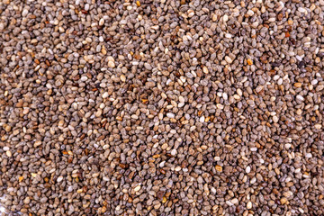 Top view of chia seeds. Can be used as background. The people of the ancient Aztec and Incan empires revered chia seeds as viral nourishment.