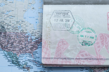 Inside page of a well traveled european passport with all kinds of stamps 