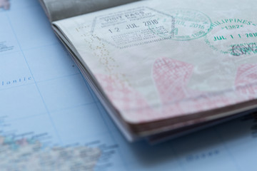 Inside page of a well traveled european passport with all kinds of stamps 