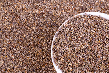 Top view of chia seeds. Can be used as background. The people of the ancient Aztec and Incan empires revered chia seeds as viral nourishment.