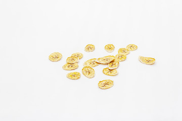 Dried slices of banana isolated on white background