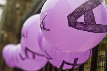 Violet ballons as a feminist symbol