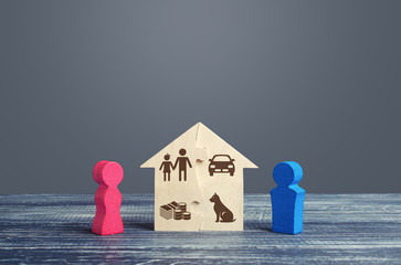 Husband and wife divide a house in a divorce process. Fair marital property division Agreement. Conflict resolution, legal services assistance. rights Infringement. Protection interests. Legality