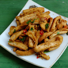  fried tofu cook with sauce and citronella, chilli,  Vietnamese food for vegetarian healthy eating