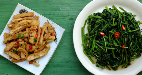 simple vegan meal for daily family menu with fried tofu cook with sauce, fried water spinach