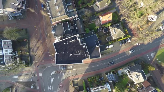 Top down aerial of rooftops and houses in Dutch shopping district