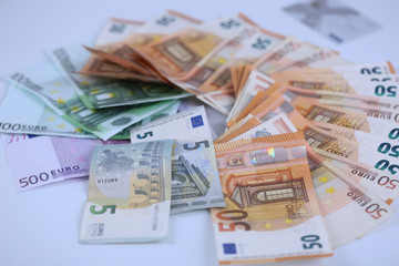 Money background of Euros. Giving money. Robery.