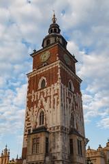 KRAKOW, POLAND - MAY, 11, 2018: Main Market Square with St. Mary's Church. It is the largest medieval town square in Europe.