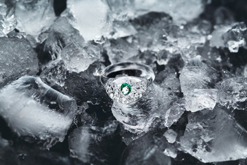 Transparent icy rings made from glass in ice and water