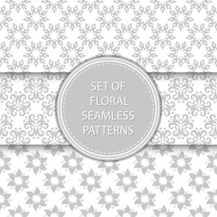 Floral seamless patterns compilation. Gray designs on white backgrounds