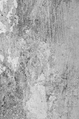 black and white texture with different cracks and chips with different relief and transitions white wall with history and cracks with unusual transitions of color and texture