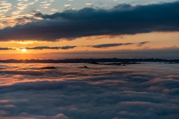Fototapeta premium Sea of ​​clouds and sunrise