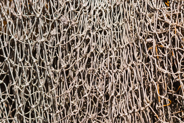 Fishnet texture, abstract marine backgound. Close up photo.