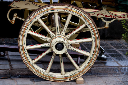 Old Painted Gypsy Caravan Wheel at a Country Fair
